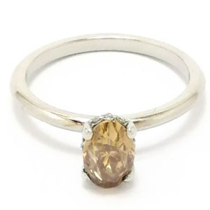 Platinum Oval Brown Diamond Ring With Diamond Edged Collet 1ct